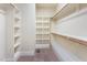Well-organized walk-in closet with built-in shelving and ample storage space at 3034 E Bay Court, Creedmoor, NC 27522