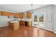 Modern kitchen features white countertops, stainless steel appliances, and wooden cabinets at 304 Frontgate Dr, Cary, NC 27519