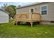 Outdoor deck in backyard with lawn at 305 Eastfield Dr, Rocky Mount, NC 27801