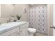 Bathroom featuring a vanity, patterned shower curtain, and a toilet at 305 Eastfield Dr, Rocky Mount, NC 27801