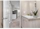 Bright bathroom vanity and view of the kitchen at 305 Eastfield Dr, Rocky Mount, NC 27801