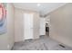 This bedroom offers carpet, neutral walls, and a view of the kitchen at 305 Eastfield Dr, Rocky Mount, NC 27801