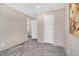 Bedroom with carpet, neutral walls, and two doors at 305 Eastfield Dr, Rocky Mount, NC 27801