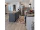 This bright kitchen features an island with seating, and stainless steel appliances at 305 Eastfield Dr, Rocky Mount, NC 27801