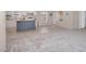 Bright kitchen featuring a kitchen island, stainless steel appliances, and an open floorplan at 305 Eastfield Dr, Rocky Mount, NC 27801
