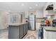 New kitchen with large kitchen island and stainless steel appliances at 305 Eastfield Dr, Rocky Mount, NC 27801