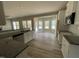 Spacious kitchen with granite countertops, stainless appliances, and breakfast bar at 308 Busterfield Ct, Benson, NC 27504