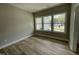 Bright and airy living room with natural light and a view of the neighborhood at 308 Busterfield Ct, Benson, NC 27504