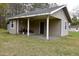 Outbuilding with covered space, bench, and backyard at 312 W Steele St, Gibsonville, NC 27249