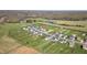 Aerial view of a neighborhood with manicured lawns and private backyards. Property location is indicated by red pin at 343 Brinkley Cir, Mebane, NC 27302