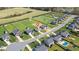 Aerial view highlighting the community's layout, nearby pond, pool, and manicured lawns. The location is marked with a red pin at 343 Brinkley Cir, Mebane, NC 27302
