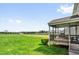 A large, grassy backyard featuring a screened porch with ample space at 343 Brinkley Cir, Mebane, NC 27302