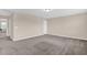 Spacious bedroom with neutral walls, plush carpet, and plenty of natural light at 343 Brinkley Cir, Mebane, NC 27302