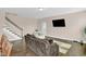 Spacious living room view highlights wood floors, staircase, and a bright atmosphere at 343 Brinkley Cir, Mebane, NC 27302