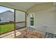 Relax on the screened porch with access to the home's back door at 343 Brinkley Cir, Mebane, NC 27302