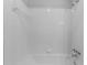 Bright white bathroom with subway tile and shower at 3743 Yorktown Pl, Raleigh, NC 27609