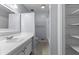 Bathroom with white sink and toilet and simple tiled floors at 3743 Yorktown Pl, Raleigh, NC 27609