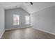 Bright bedroom features luxury vinyl plank flooring and natural light at 3905 Joe And Ruth Lee Dr, Raleigh, NC 27610