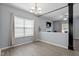 Open concept dining room with wood floors and view of living room at 3905 Joe And Ruth Lee Dr, Raleigh, NC 27610