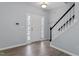 Inviting foyer with stained glass side panels on the front door and a staircase at 3905 Joe And Ruth Lee Dr, Raleigh, NC 27610
