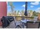 Outdoor back deck features a grill, table, seating and a view of the trees at 404 Cotton Brook Dr, Fuquay Varina, NC 27526