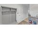 Hallway featuring wood floors, coat rack, and decor at 404 Cotton Brook Dr, Fuquay Varina, NC 27526