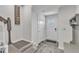 Welcoming foyer with coat rack and white door at 404 Cotton Brook Dr, Fuquay Varina, NC 27526