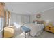 Bright bedroom with large windows and a calming color scheme, perfect for relaxation at 5120 Knaresborough Rd, Raleigh, NC 27612