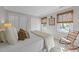 A serene bedroom featuring soft colors, natural light, and decorative window coverings at 5120 Knaresborough Rd, Raleigh, NC 27612