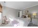 Cozy bedroom featuring neutral tones, comfortable furnishings and calming decor at 5120 Knaresborough Rd, Raleigh, NC 27612