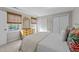 Inviting bedroom showcasing natural light, wood accents, and ample storage at 5120 Knaresborough Rd, Raleigh, NC 27612