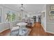 Open concept kitchen and breakfast nook with abundant natural light and modern finishes at 5120 Knaresborough Rd, Raleigh, NC 27612