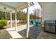 View of the backyard and patio area that features stone floors and outdoor seating at 524 Beckwith Ave, Clayton, NC 27527