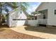 Spacious backyard with a detached garage and a charming covered porch area at 524 Beckwith Ave, Clayton, NC 27527