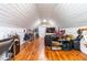 Stylish bonus room with hardwood floors, a comfortable seating area, and ample space at 524 Beckwith Ave, Clayton, NC 27527