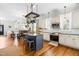 Open kitchen showcasing granite countertops, island seating, and stainless steel appliances at 524 Beckwith Ave, Clayton, NC 27527