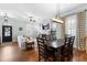Living room showcasing a fireplace, TV, and cozy seating that transitions into dining area at 524 Beckwith Ave, Clayton, NC 27527