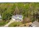 Aerial view of a beautiful two-story home with a well-manicured lawn and mature trees at 53 Stafford Cir, Clayton, NC 27527