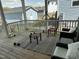 Cozy back porch featuring outdoor seating, a rug, and workout equipment at 555 Vine Pkwy, Pittsboro, NC 27312