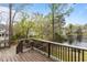 Spacious back deck overlooking the lake, perfect for outdoor entertaining at 6209 Remington Lake Dr, Raleigh, NC 27616