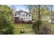 A charming two-story home with a spacious deck and beautiful landscaped yard, ideal for outdoor living and entertaining at 6209 Remington Lake Dr, Raleigh, NC 27616
