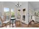Cozy breakfast nook featuring large windows with scenic views, perfect for relaxed dining at 6209 Remington Lake Dr, Raleigh, NC 27616