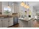 Contemporary kitchen with granite counters, stainless appliances and breakfast nook at 6209 Remington Lake Dr, Raleigh, NC 27616