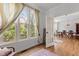 Sitting Room area with large windows and view at 6209 Remington Lake Dr, Raleigh, NC 27616