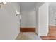 Hallway with tile flooring, neutral walls, and recessed lighting leads to living area at 6719 Falconbridge Rd, Chapel Hill, NC 27517
