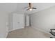 This carpeted bedroom includes ample closet space at 676 Wall Rd, Wendell, NC 27591