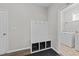 Mudroom/laundry area features a built-in coat rack with bench and access to a laundry room at 676 Wall Rd, Wendell, NC 27591