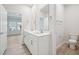 Modern bathroom with double vanity sinks and toilet at 700 Deschutes Dr, Garner, NC 27529