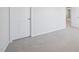 Cozy bedroom featuring plush carpeting, neutral walls, and ample natural light at 700 Deschutes Dr, Garner, NC 27529