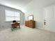 Bedroom with neutral carpet, office desk, and lots of light at 7125 Crested Iris Pl, Durham, NC 27703